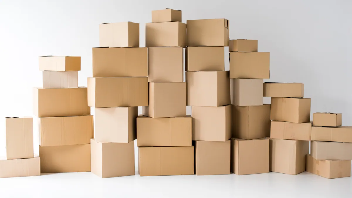 A stack of cardboard boxes against a white background